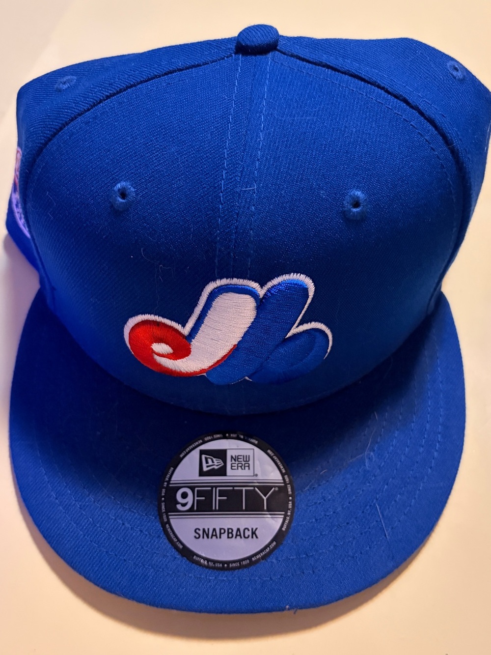 New Era Adult  Blue Snapback Cap with Multicolor Expos Logo